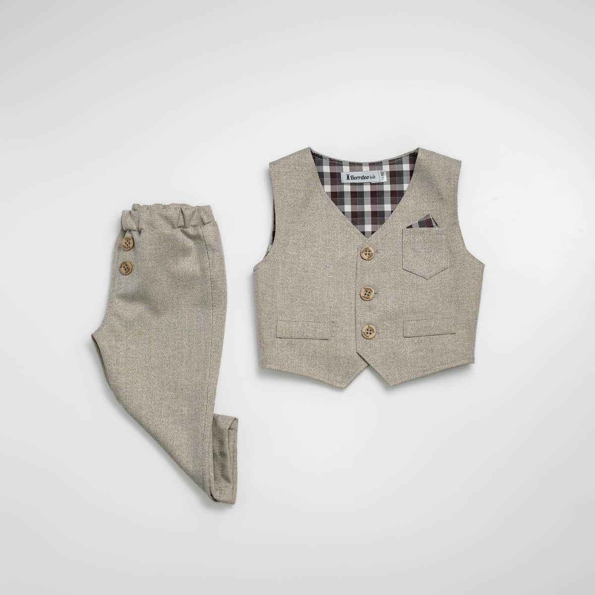 Komplet za bebu prsluk pantalone bež OD045