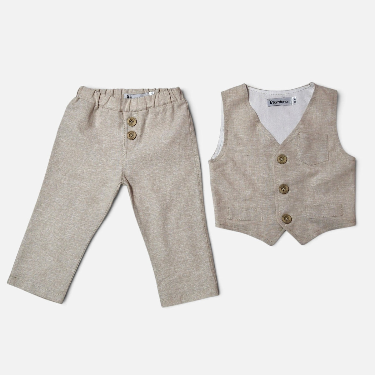 A two-piece children's outfit set featuring light beige linen trousers with three front buttons and a matching linen vest with three front buttons, laid flat on a light gray background.